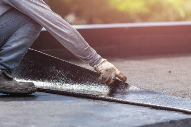 Professional Emergency Waterproofing technician working in Riley, KS